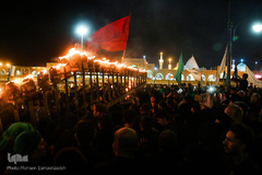 آیین مشعل گردانی نجفی‌های مقیم مشهد در شب تاسوعا‎
