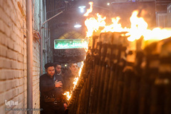 آیین مشعل گردانی نجفی‌های مقیم مشهد در شب تاسوعا‎
