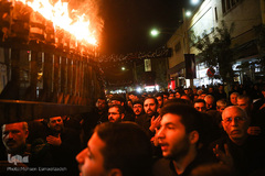 آیین مشعل گردانی نجفی‌های مقیم مشهد در شب تاسوعا‎
