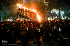 آیین مشعل گردانی نجفی‌های مقیم مشهد در شب تاسوعا‎
